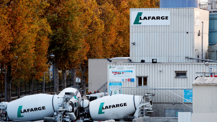 Lafarge accused of paying Islamic State group to keep Syria plant running, faces trial in France